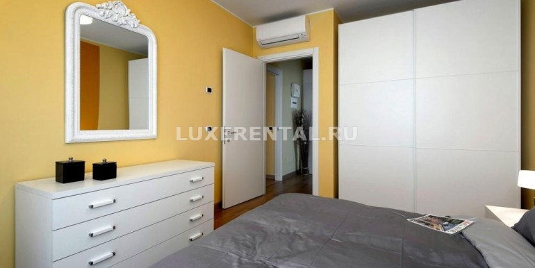 rent-milan-apartment-camera-letto
